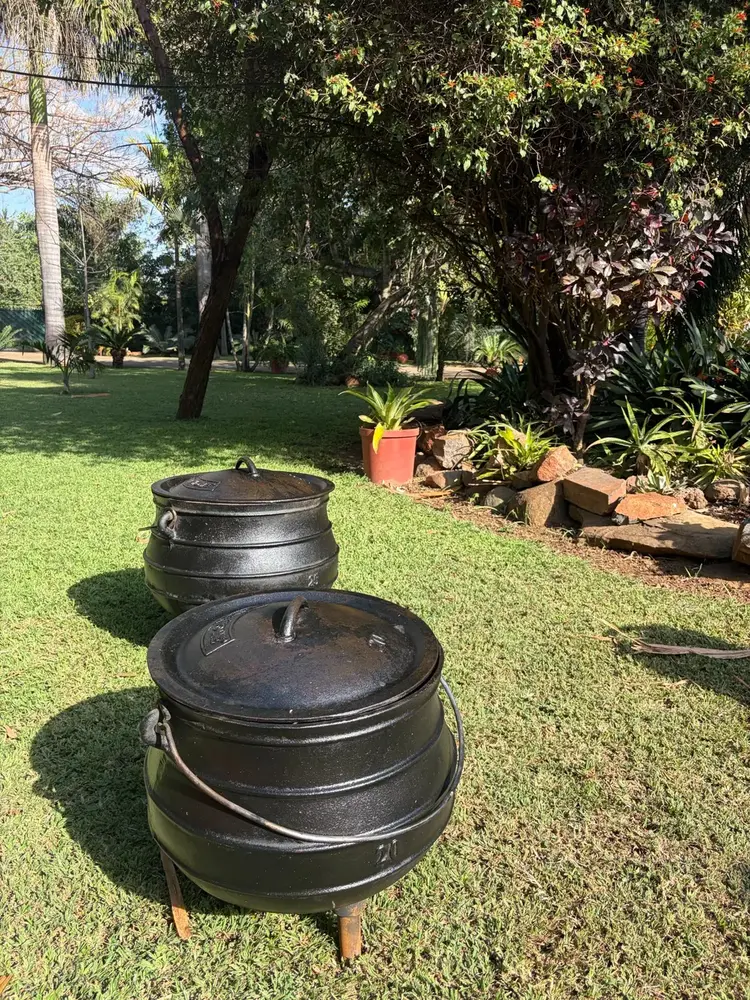 Large covered traditional cooking pots